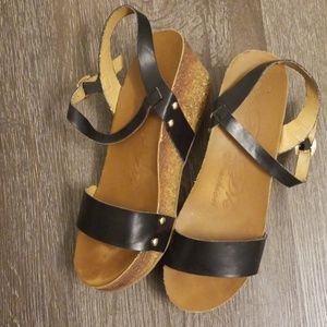 Black Comfortable Sandals with Gold Accents